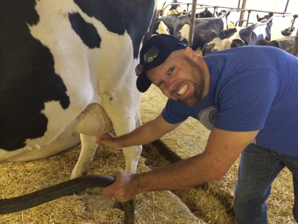Russ Milking A Cow