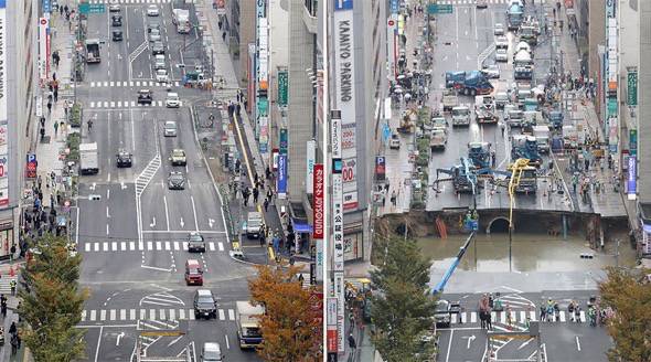 Time-Lapse Video Of A 50-Foot Sinkhole Being Repaired In Just One Week