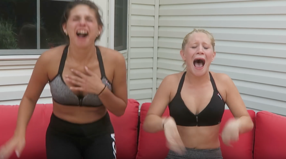 Girls Eating Carolina Reaper Pepper