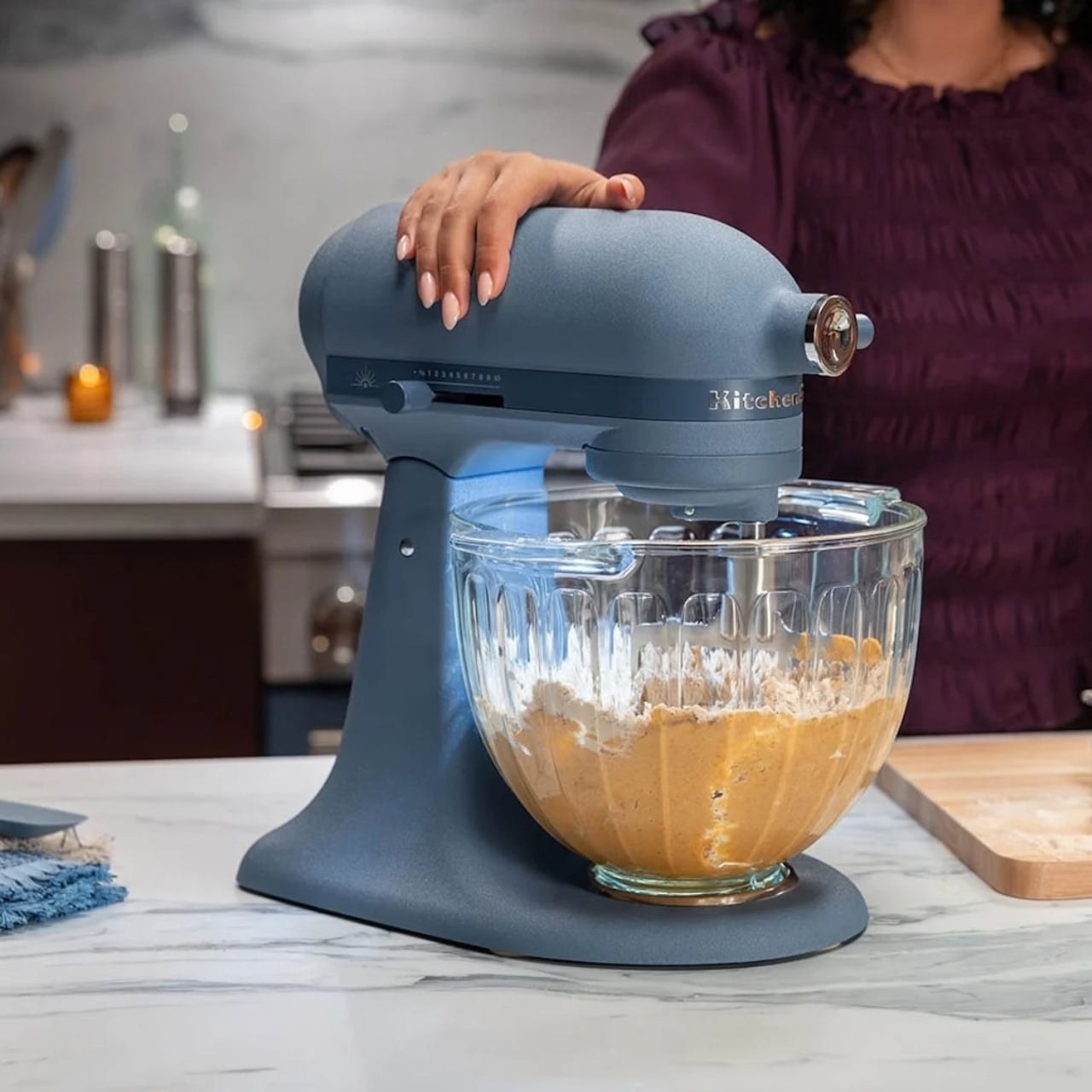 KitchenAid Luminaire Blue Peppercorn mixer on a kitchen counter