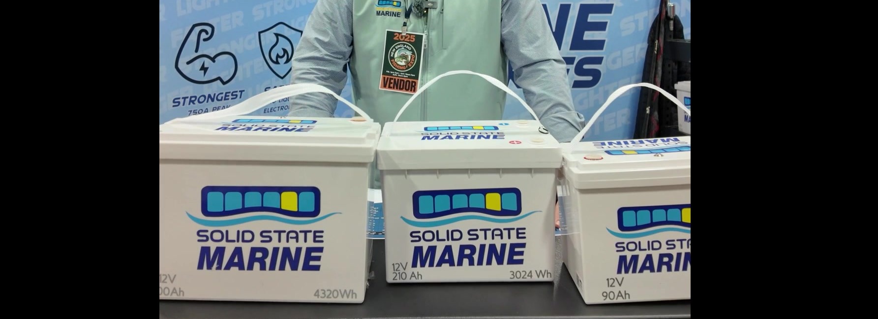 Solid State Marine 12V 90Ah with larger siblings on trade show table
