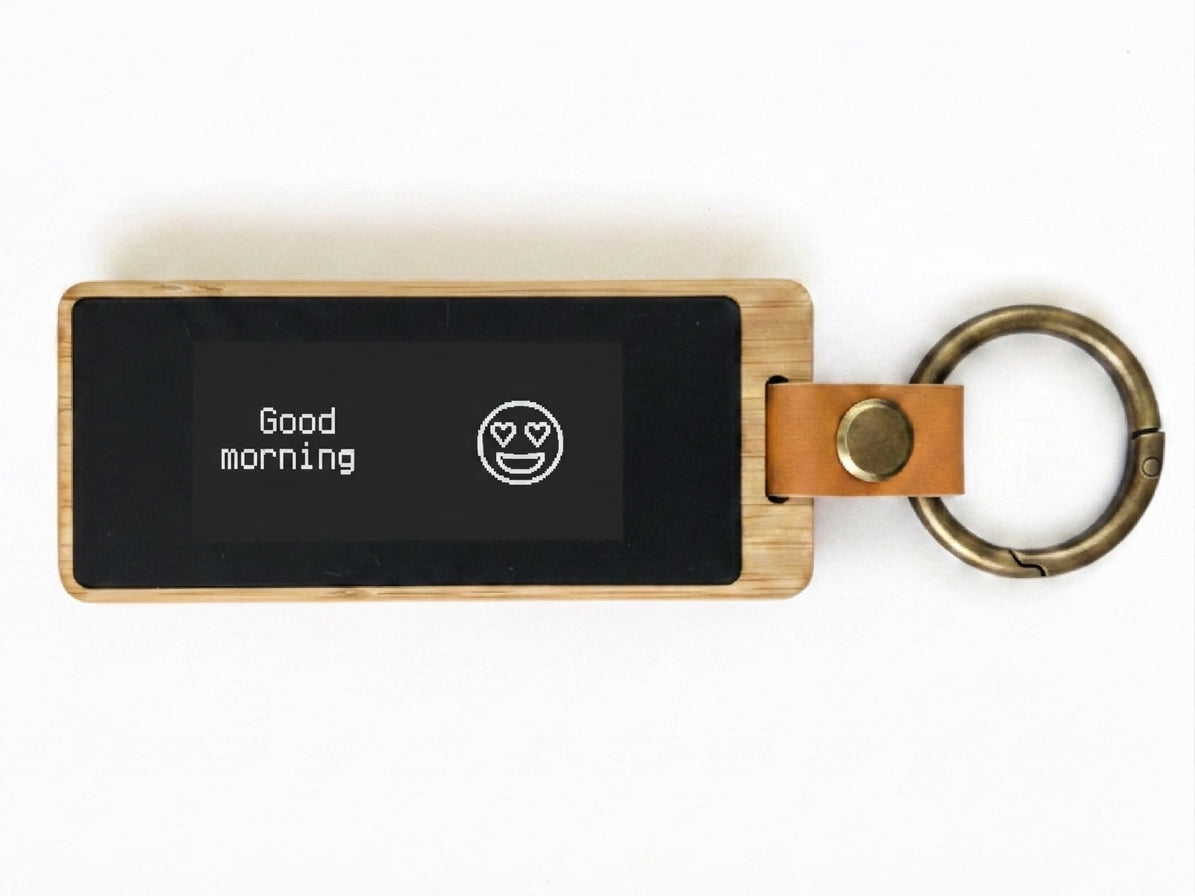 Lovebox KEEP e-ink keychain showing a good morning note