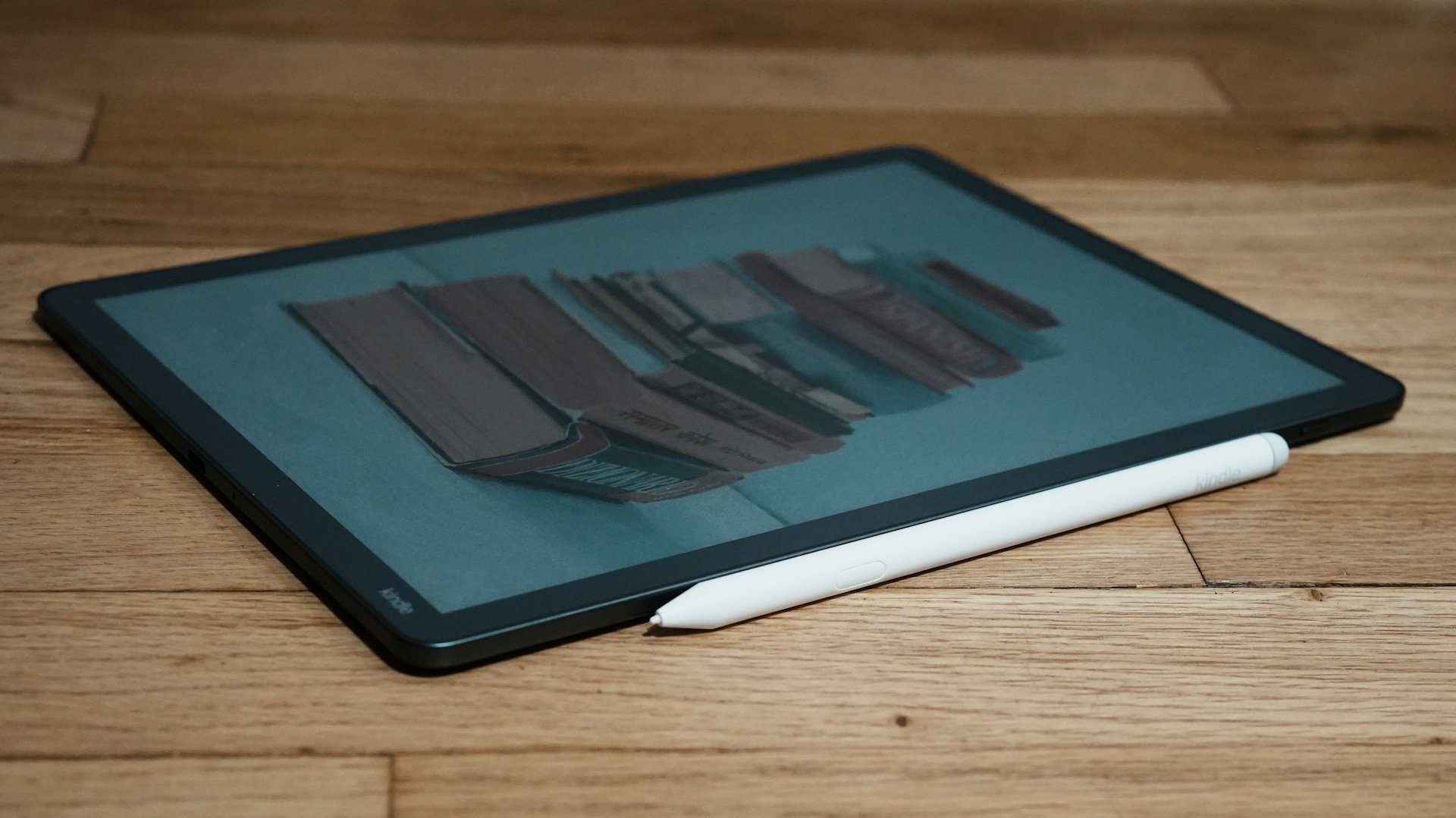 Kindle Scribe Colorsoft Premium Pen resting on the color e-ink display