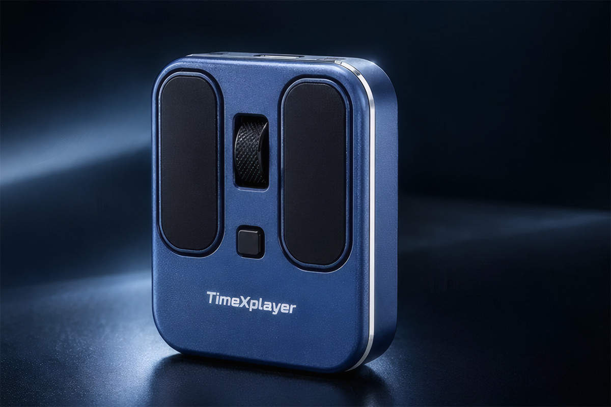 TimeXplayer V2 pocketable flat mouse on a desk with laptop