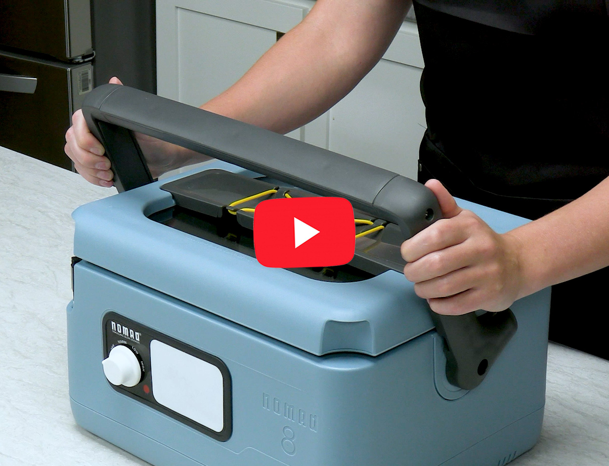 Detail of Presto Nomad dual locking lid latches on the traveling slow cooker