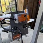 PETG mag mount holding Champion WheelyBird wireless receiver on trap frame