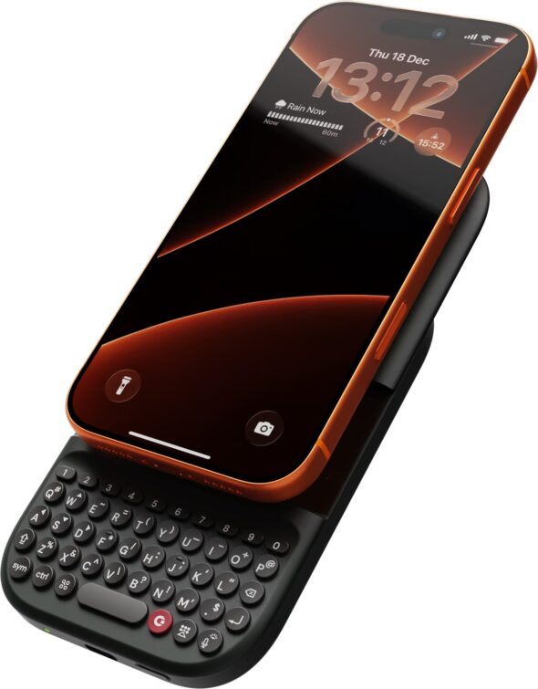 Clicks Power Keyboard slid out under an iPhone with an orange case