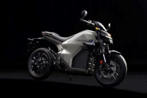 Honda WN7 electric motorcycle in silver gray on a dark studio background