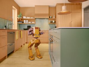 Tuesday Labs Voxel Series-1 robot butler standing in a modern wood kitchen