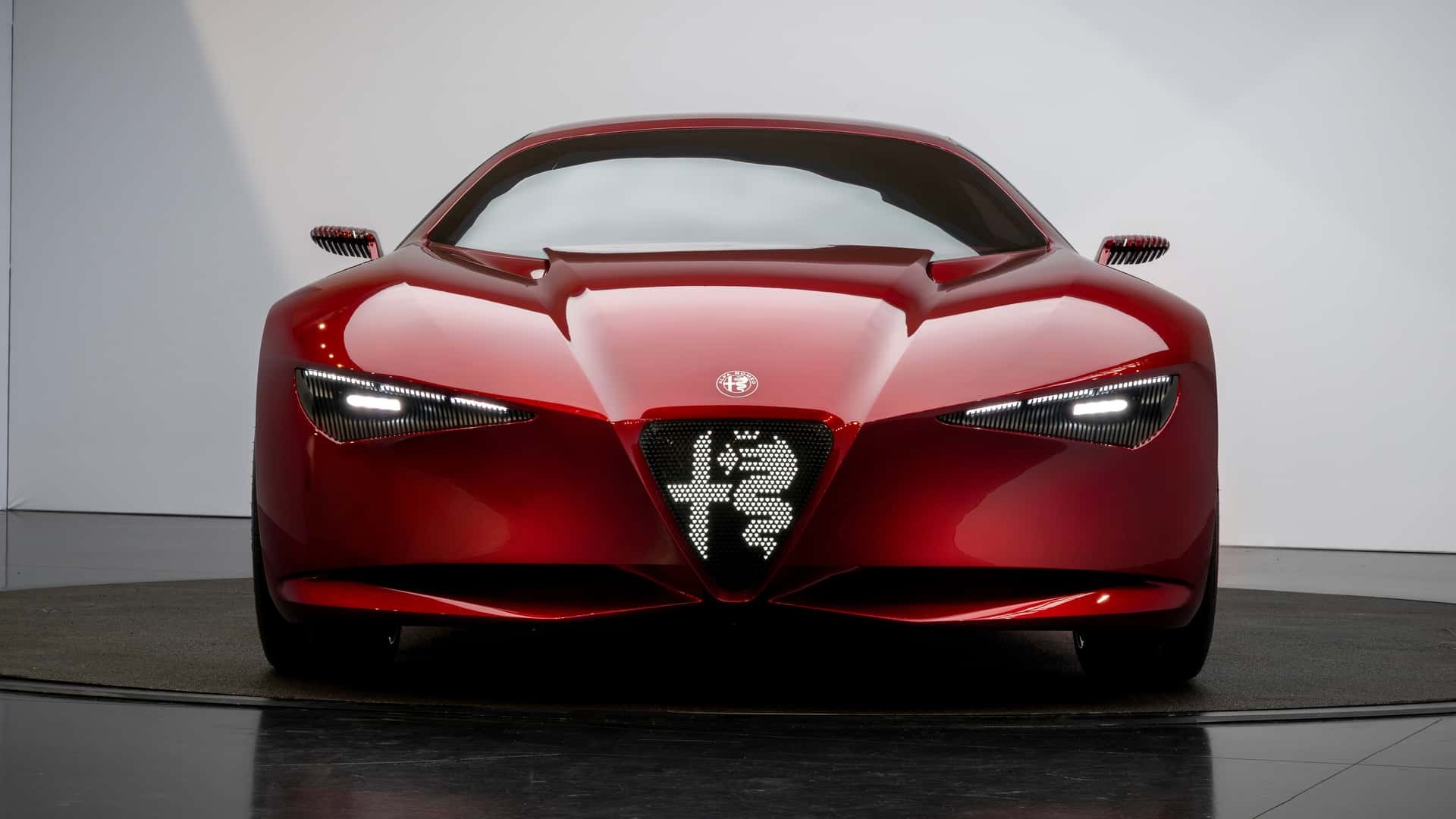 Front view of the Alfa Romeo Cuorerosso concept with scudetto grille and slim headlights