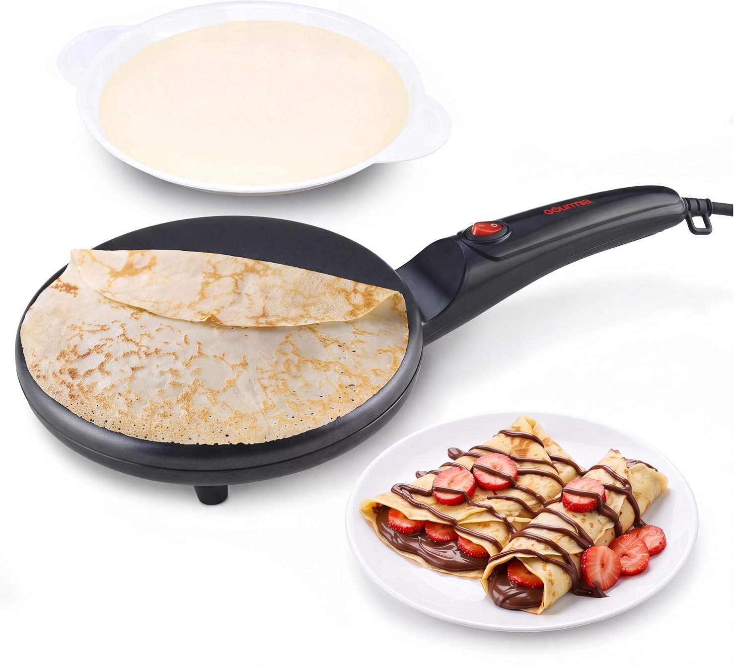 Gourmia dip and cook electric crepe maker in black with crepes, a batter tray and a plate of strawberry crepes