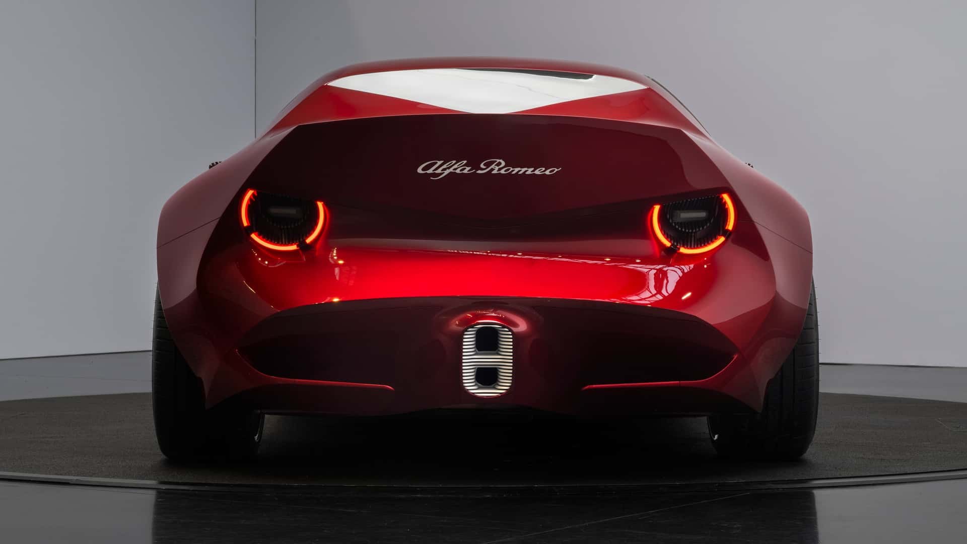 Rear of the Alfa Romeo Cuorerosso concept showing the truncated coda tronca tail and round taillights