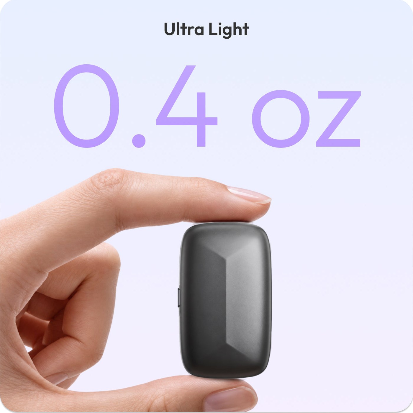 Memoket Gem held between fingers showing its 0.4 oz size