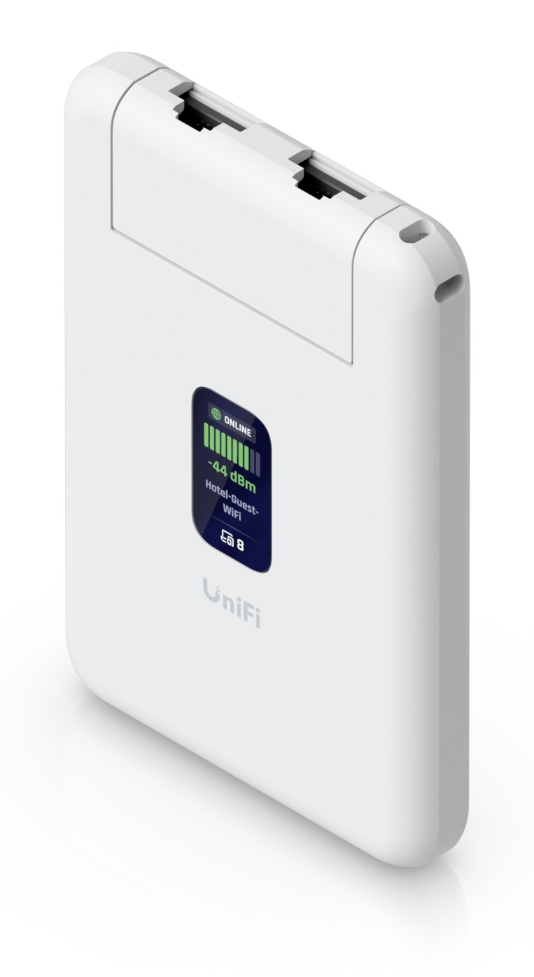Angled view of the UniFi Travel Router with its two Ethernet ports exposed under the flip-up top