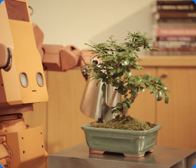 Voxel robot watering a small bonsai tree with a metal watering can