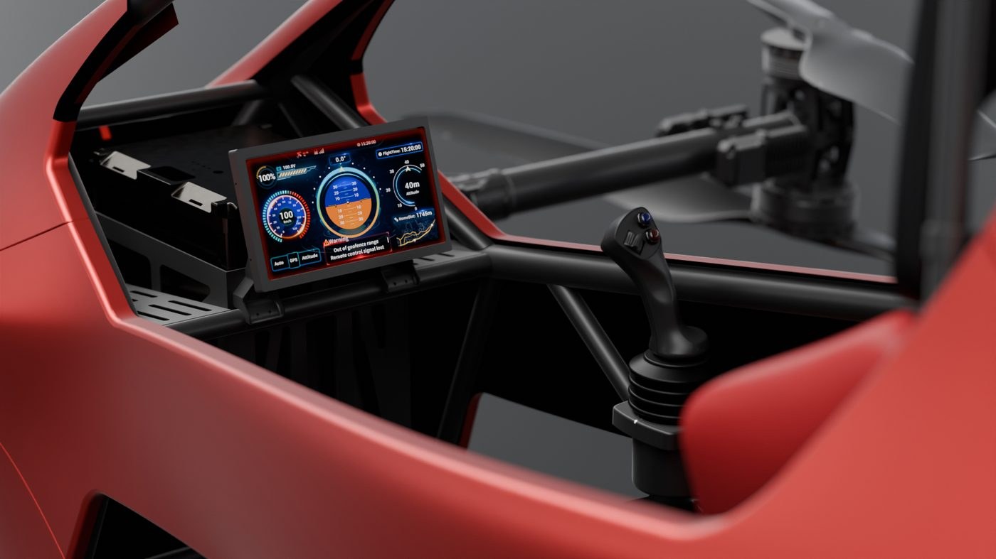 Close-up of the YIVTOL S-Zero cockpit with a color flight display and a side joystick
