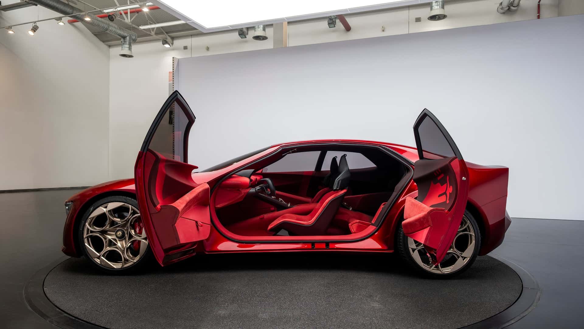 Alfa Romeo Cuorerosso concept with front and rear-hinged rear doors open showing red interior
