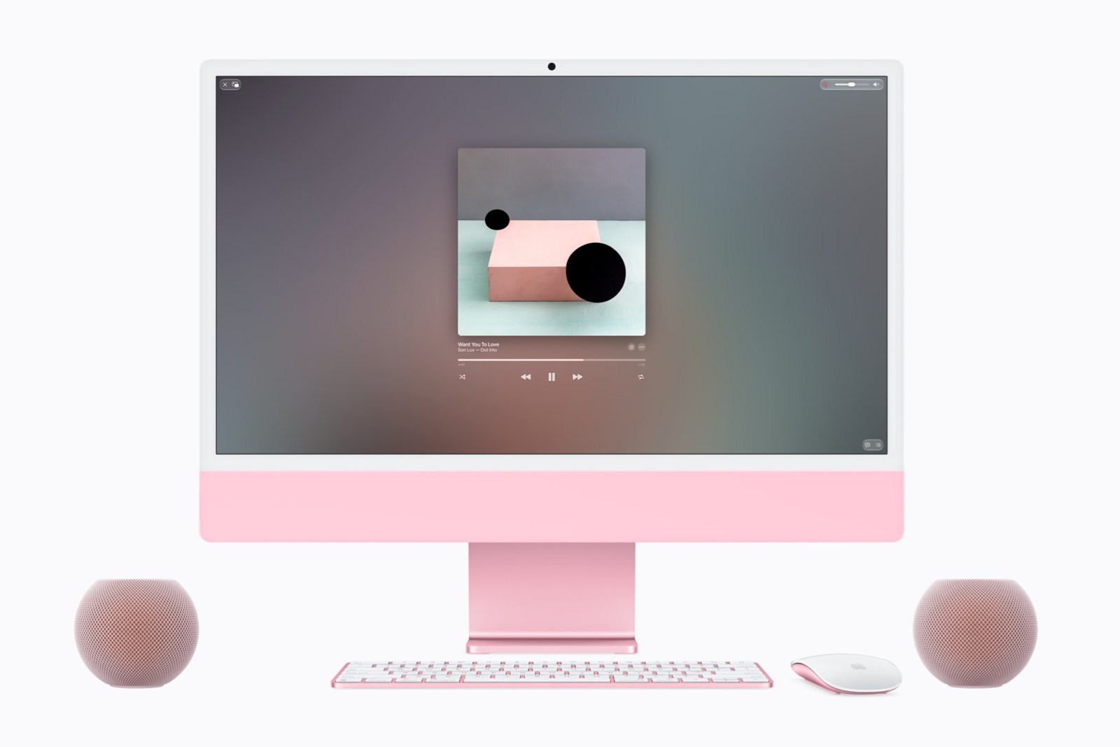 Pink HomePod mini 2 pair working as speakers for an iMac