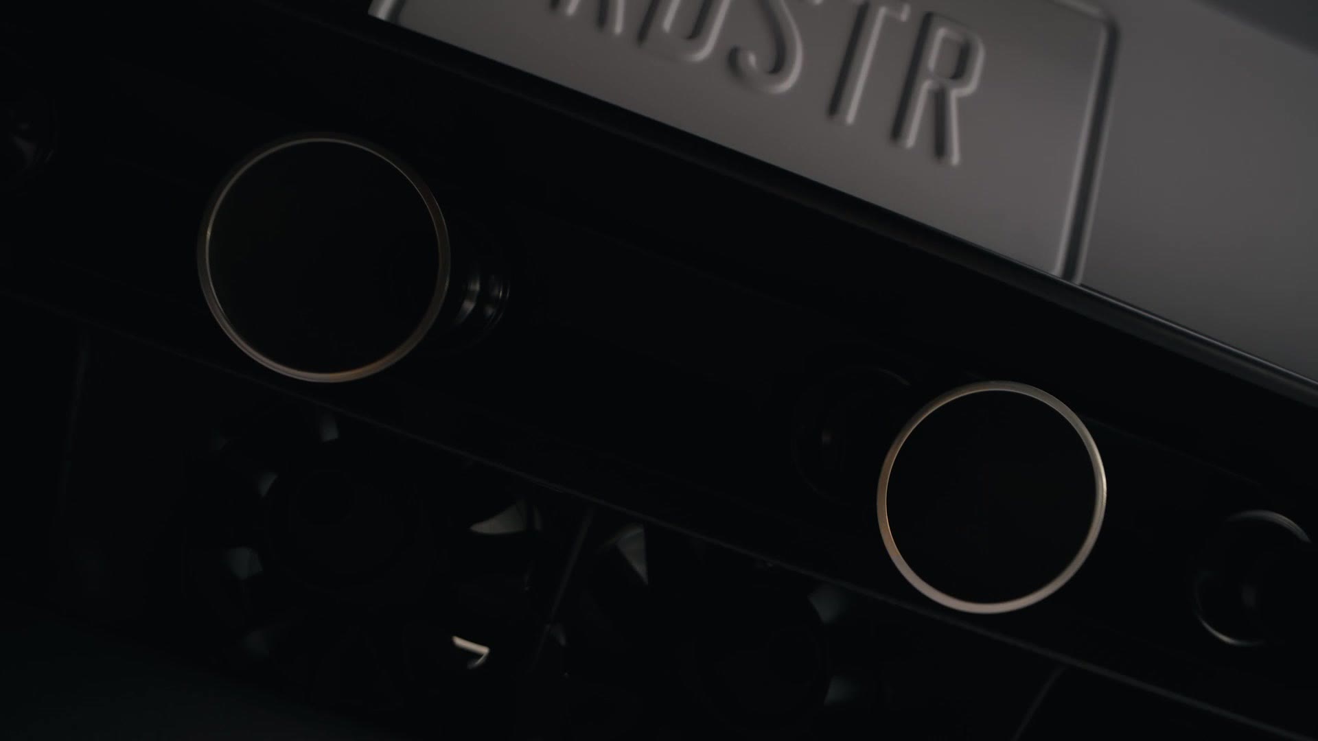Close-up of Tesla Roadster rear nozzles and RDSTR plate