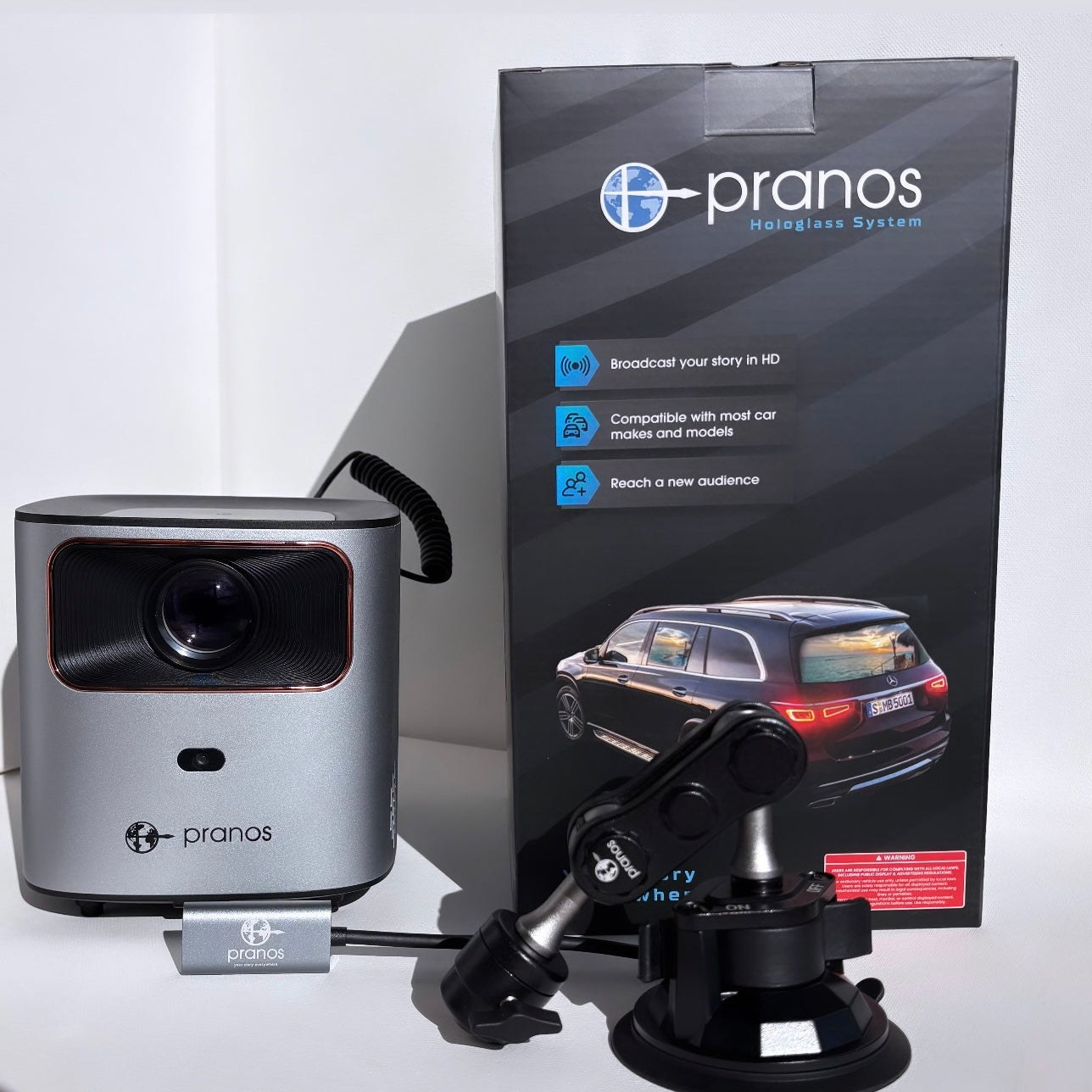 Pranos HoloGlass projector unit with suction-cup mount and retail box