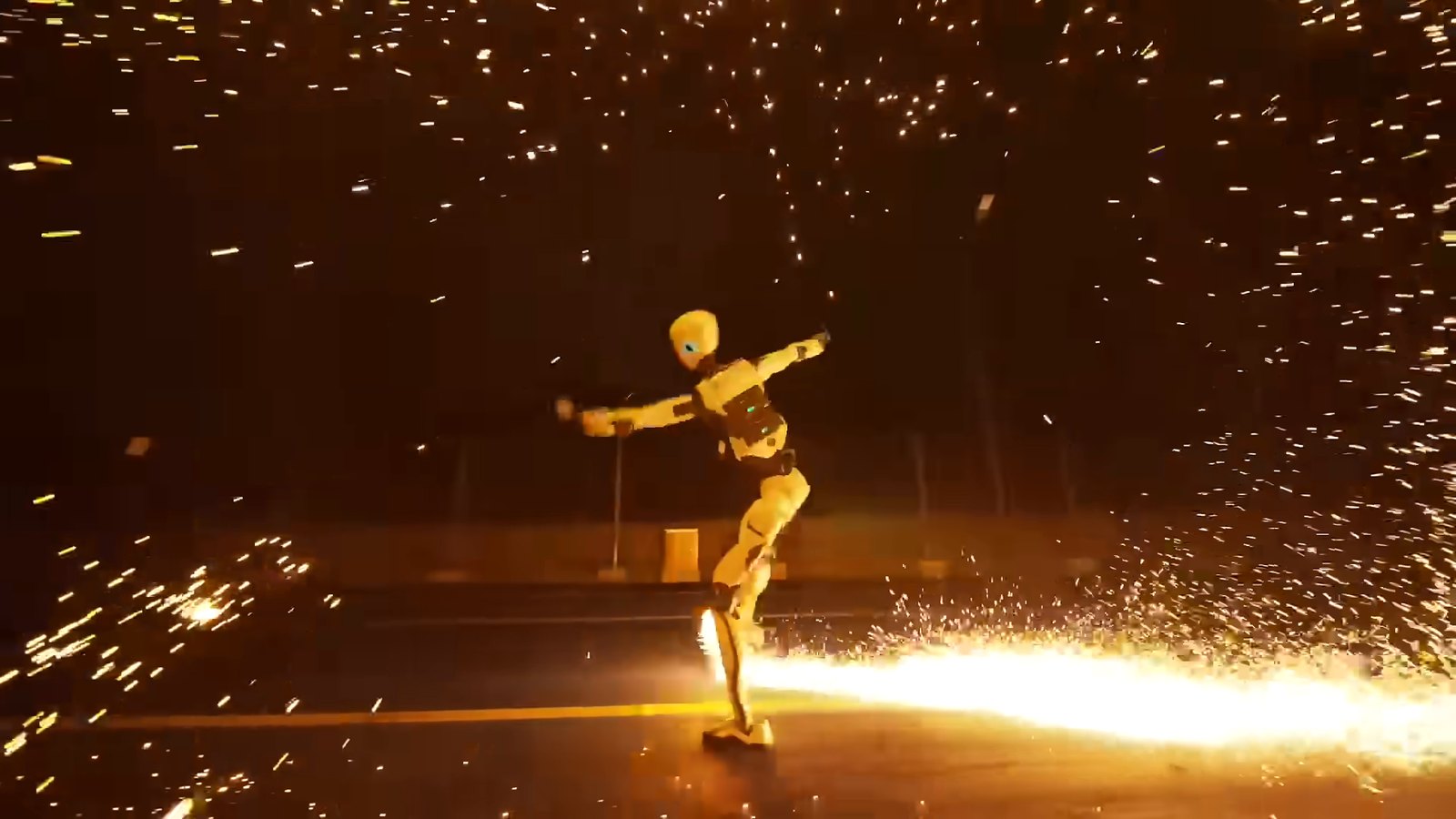 A gold Unitree H2-X humanoid robot striking a kung fu pose in a shower of sparks